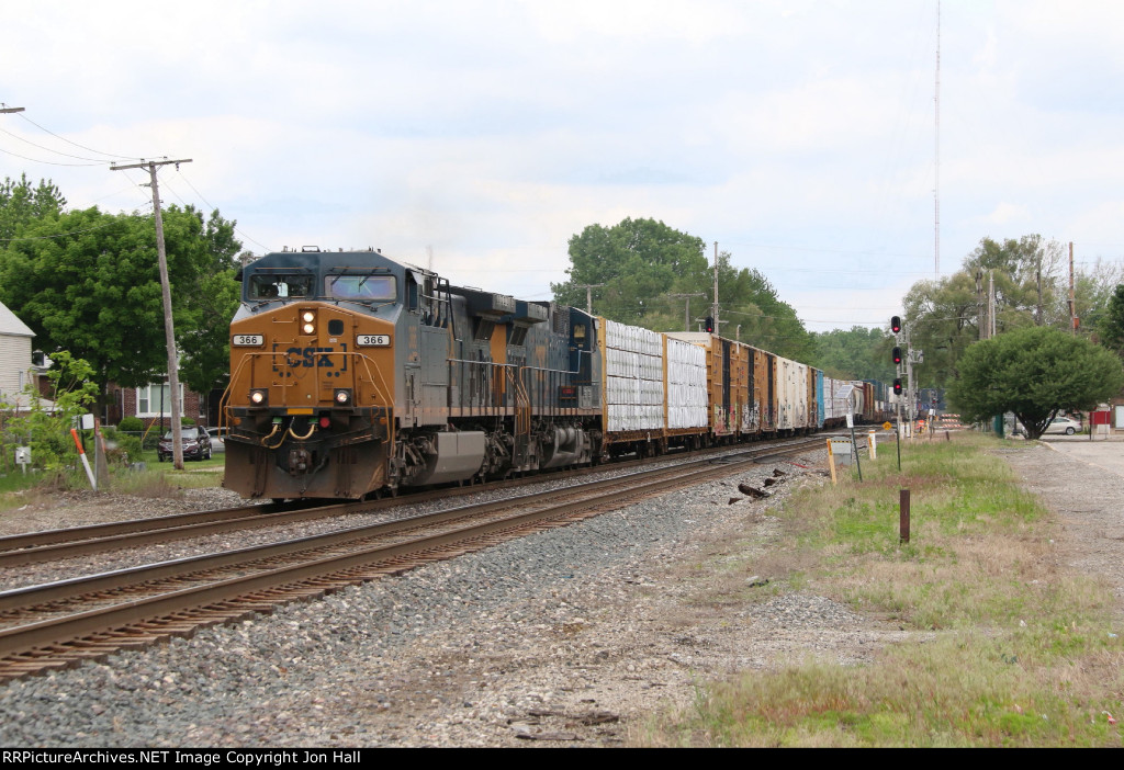 CSX 366 & 112 lead Q158 eastward with a block of general freight on the headend